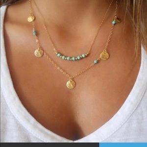 Beautiful turquoise and gold 2 tier necklace.